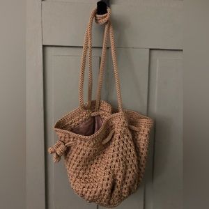 The Sak crochet shoulder crossbody ecru color bag. Excellent condition